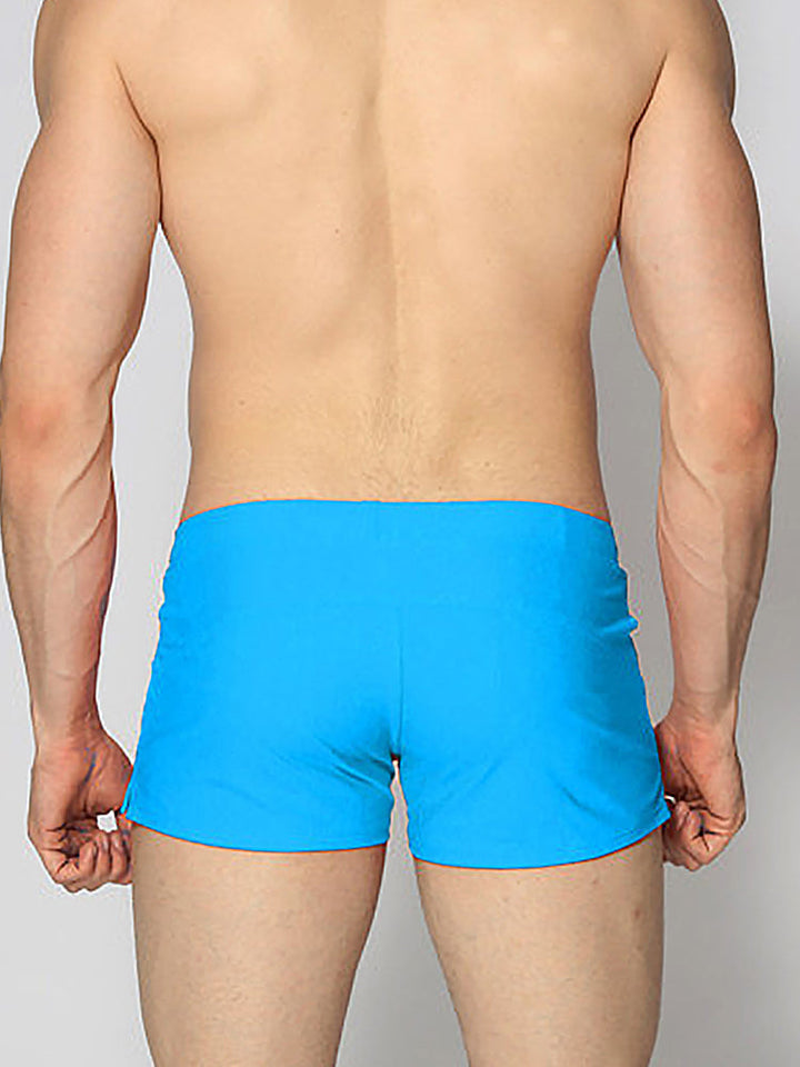 Maillot de bain stretch respirant de couleur unie pour hommes