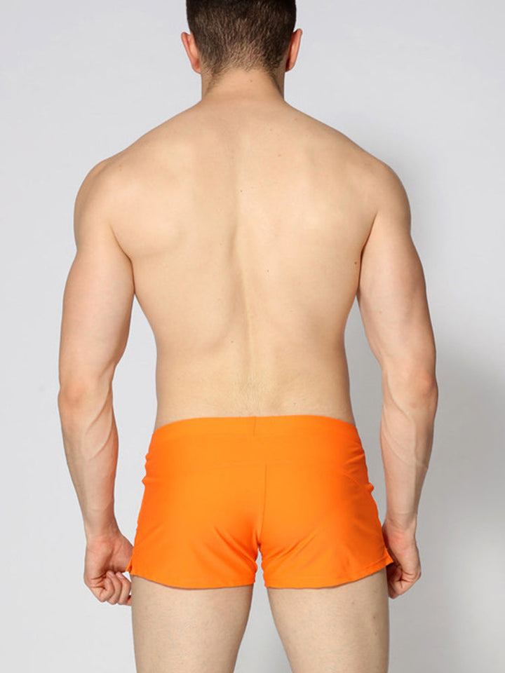 Maillot de bain stretch respirant de couleur unie pour hommes